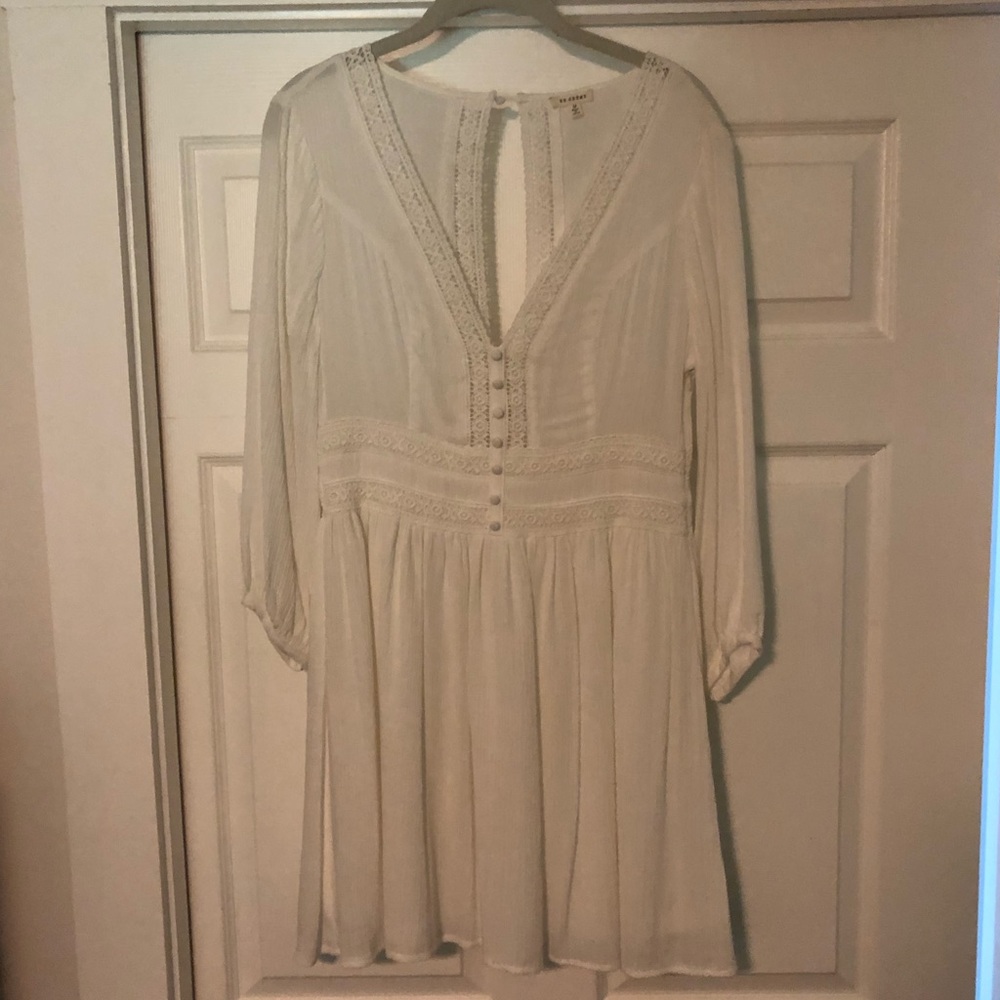 White lacy long sleeve dress with open back